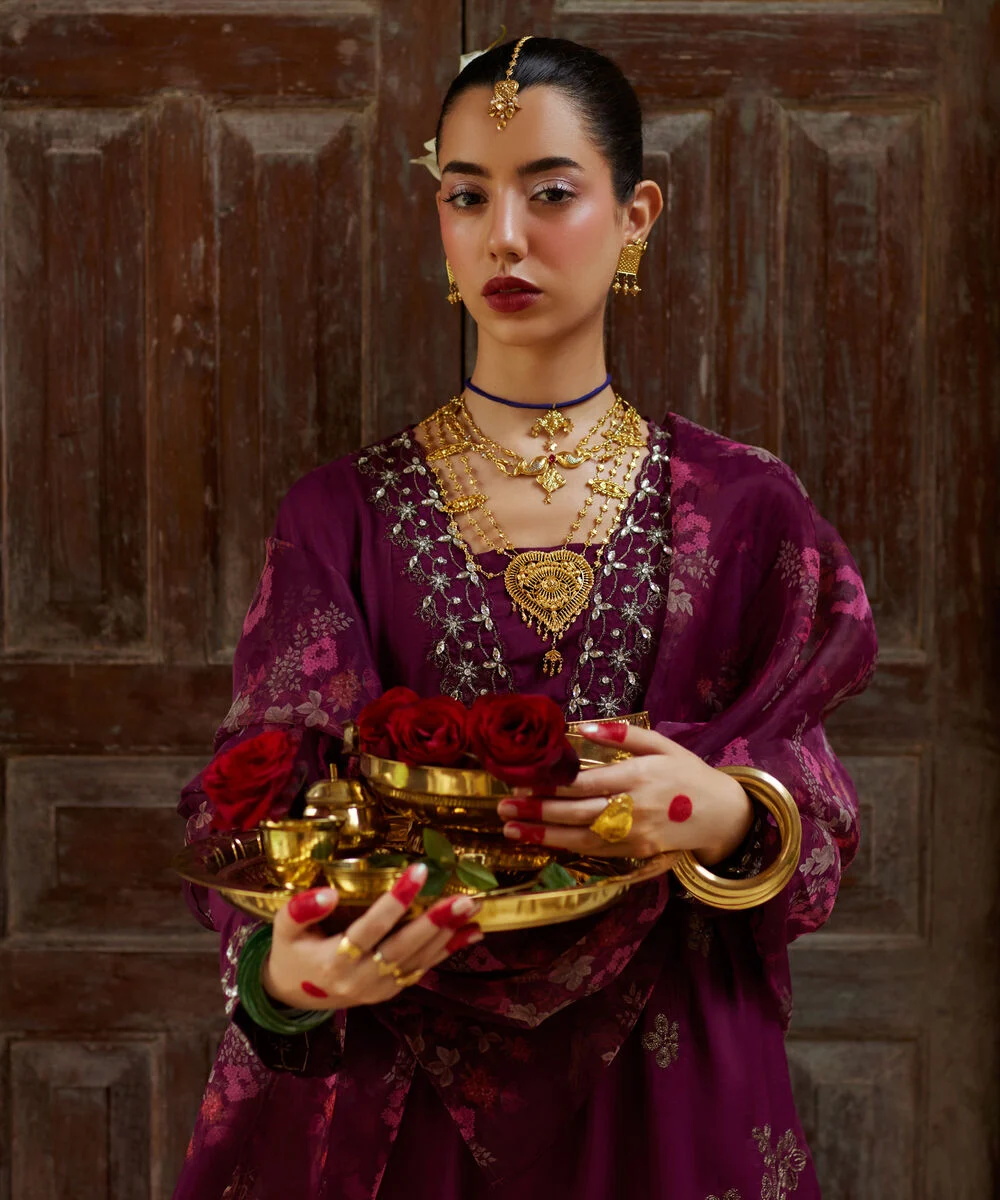 Front view of plum embroidered formal suit